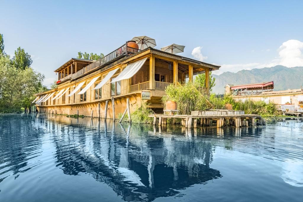 Iconic houseboat on Dal Lake, Kashmir, surrounded by serene waters 