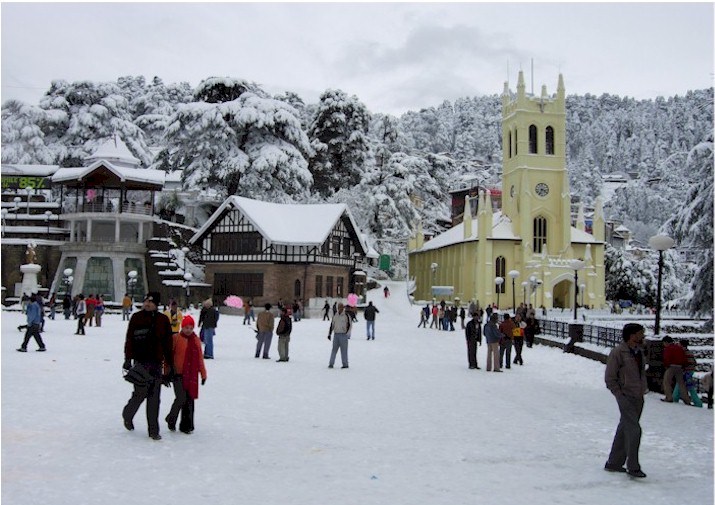 People walking in the snow in Shimla