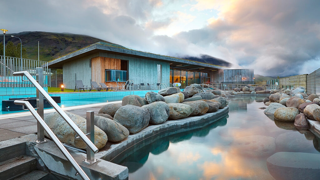 hot spring surrounded by Icelandic landscape