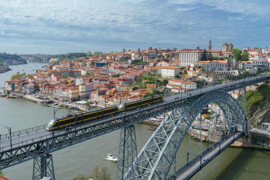 The scenic riverfront of Porto, offering picturesque views and a lively atmosphere.